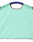 Back view of the mint green Coffee Cats tote bag with blue and white rope-style handles.