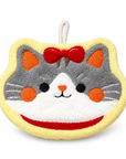 Hanging hand towel with a gray and white cat face, orange accents, a red bow, yellow trim, and a hanging loop at the top.