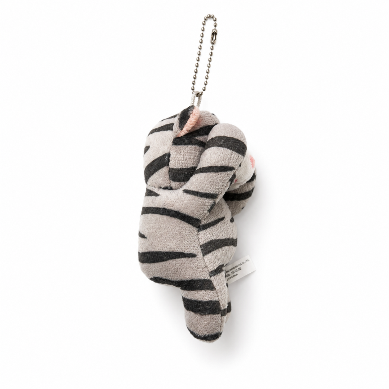 A side view of a gray tabby cat plush charm with a silver ball chain, showing its full, rounded shape and plush volume.