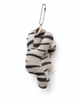 A side view of a gray tabby cat plush charm with a silver ball chain, showing its full, rounded shape and plush volume.