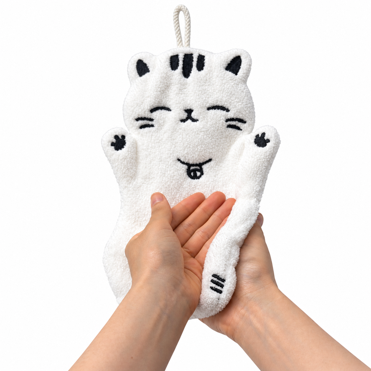 Hands drying with a soft white full-body cat-shaped hand towel, showing its fluffy texture.