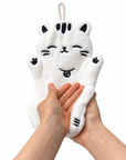 Hands drying with a soft white full-body cat-shaped hand towel, showing its fluffy texture.