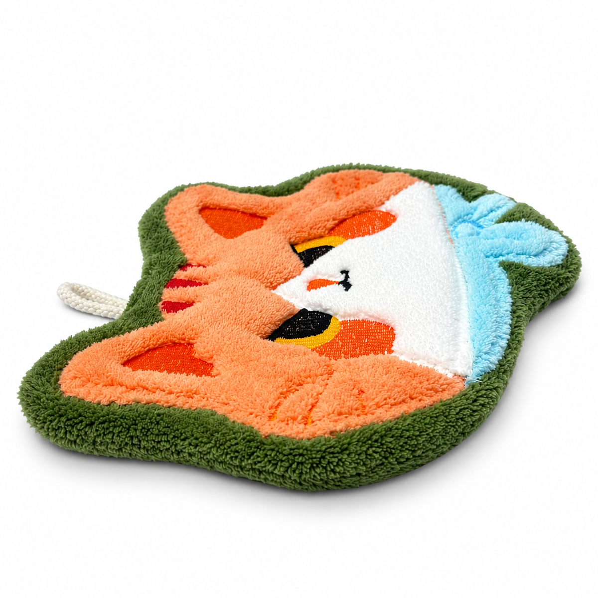 Side view of the orange cat-face-shaped hand towel.