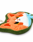 Side view of the orange cat-face-shaped hand towel.