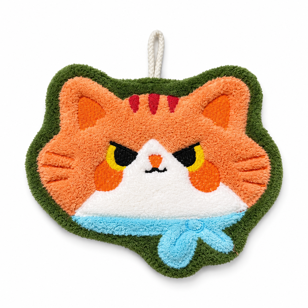 Orange cat-face-shaped hand towel with a light blue scarf around its neck, green trim, and a hanging loop.